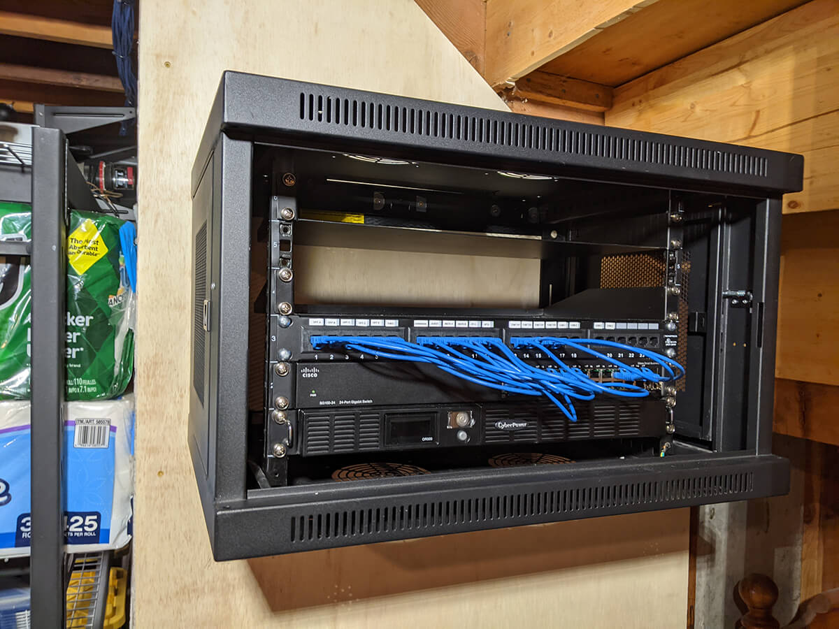 Rack with the patch panel, switch and ups